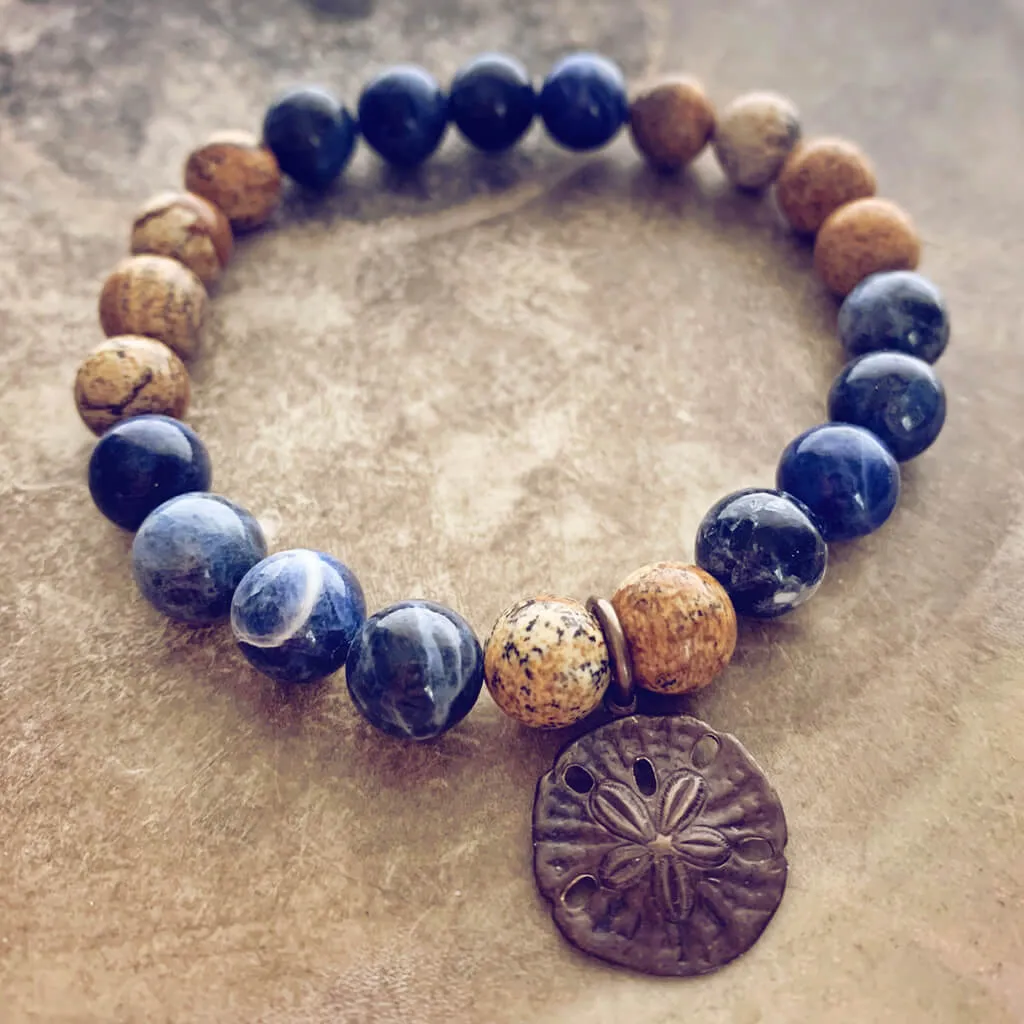 sand & sea // sodalite and picture jasper mala bead bracelet with sand dollar