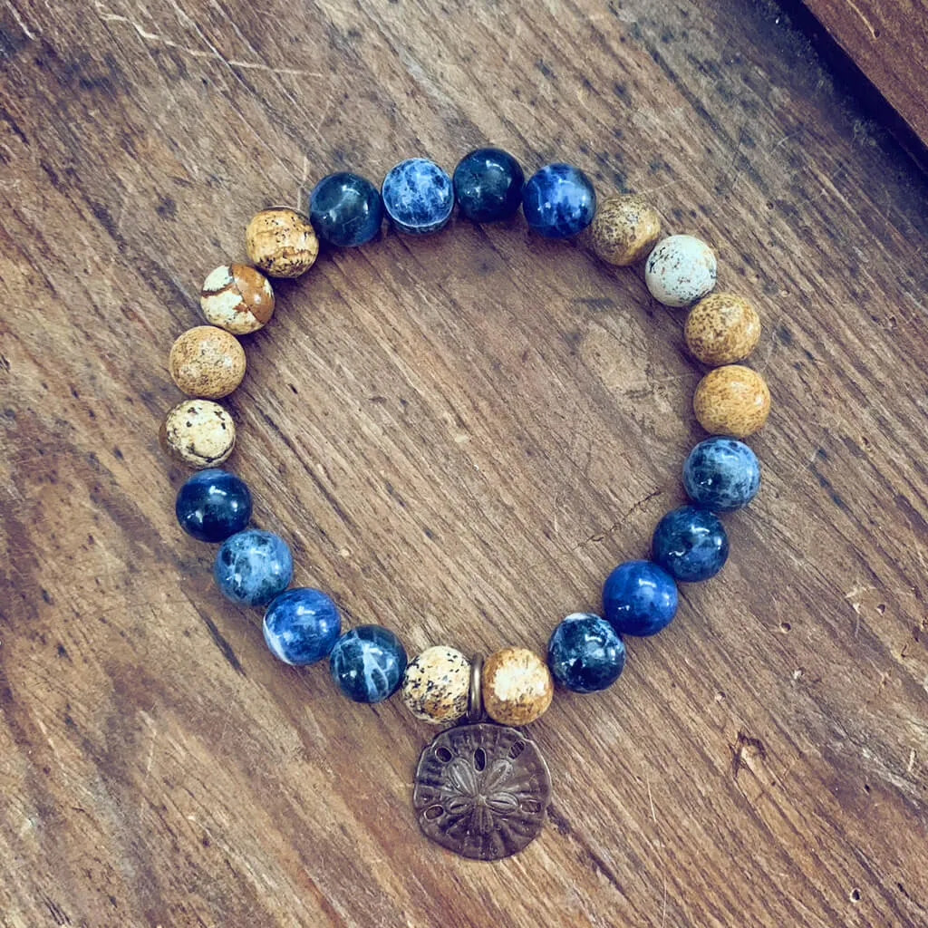 sand & sea // sodalite and picture jasper mala bead bracelet with sand dollar