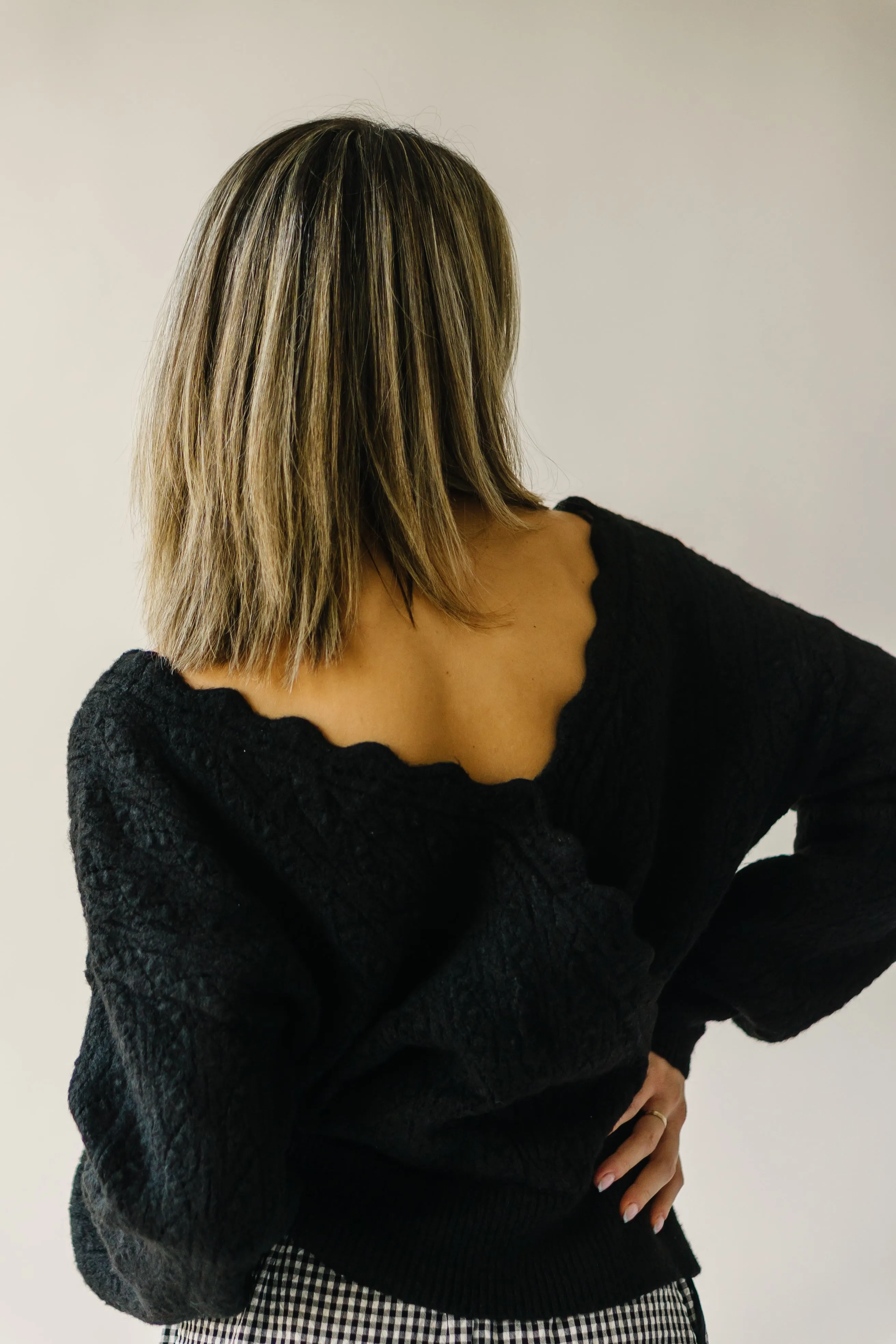 The Tagger Knit Wrap Sweater in Black