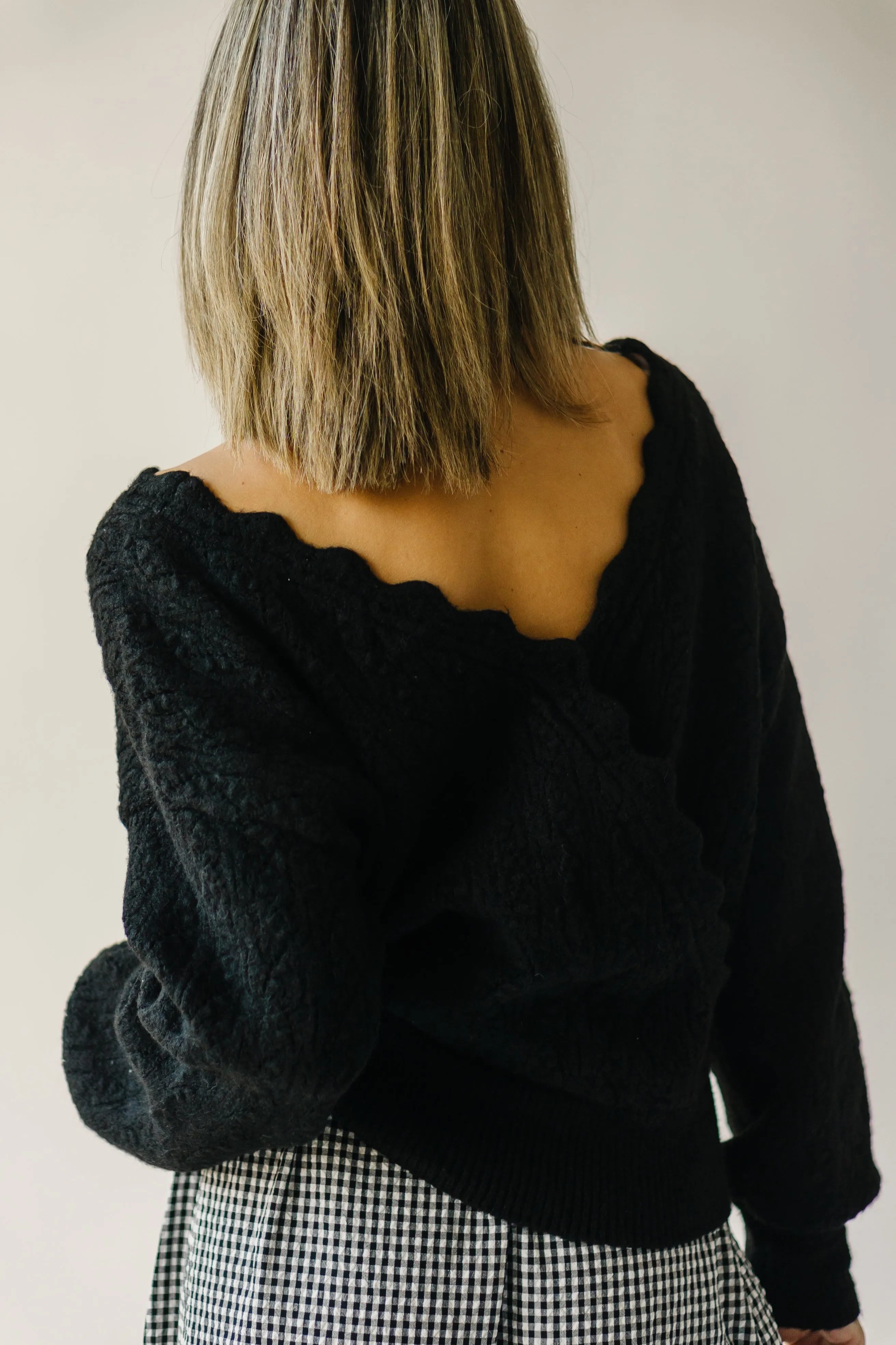 The Tagger Knit Wrap Sweater in Black